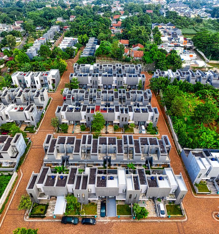 The Art of Drawing Readers In: Your attractive post title goes here A vibrant aerial view capturing the modern residential complexes in Banten, Indonesia, amidst lush greenery.